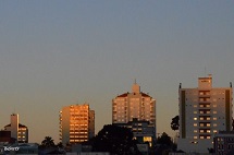 Por do sol em edificações em Caçador - foto Erci Bohrer